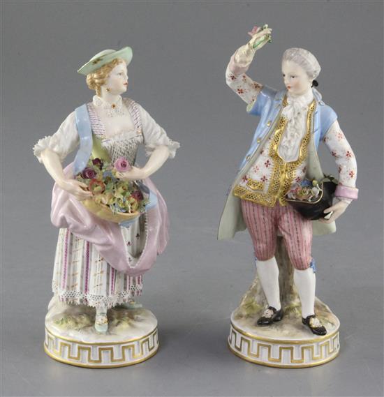 A pair of Meissen figures of gardeners, late 19th century, 17.5cm and 16cm, some restoration to the gentleman